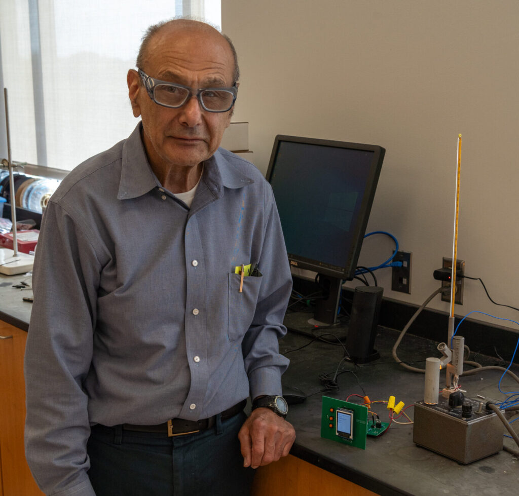 Photo of Prof. Poppiti with one of the thermocouples he developed for the lab