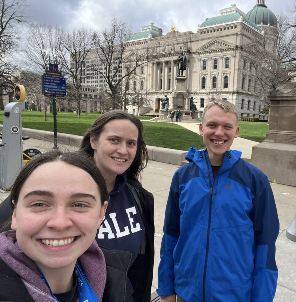 Photo of Prof. Buettner with students, Micaylah Bowers and Ethan Clare in Indianapolis